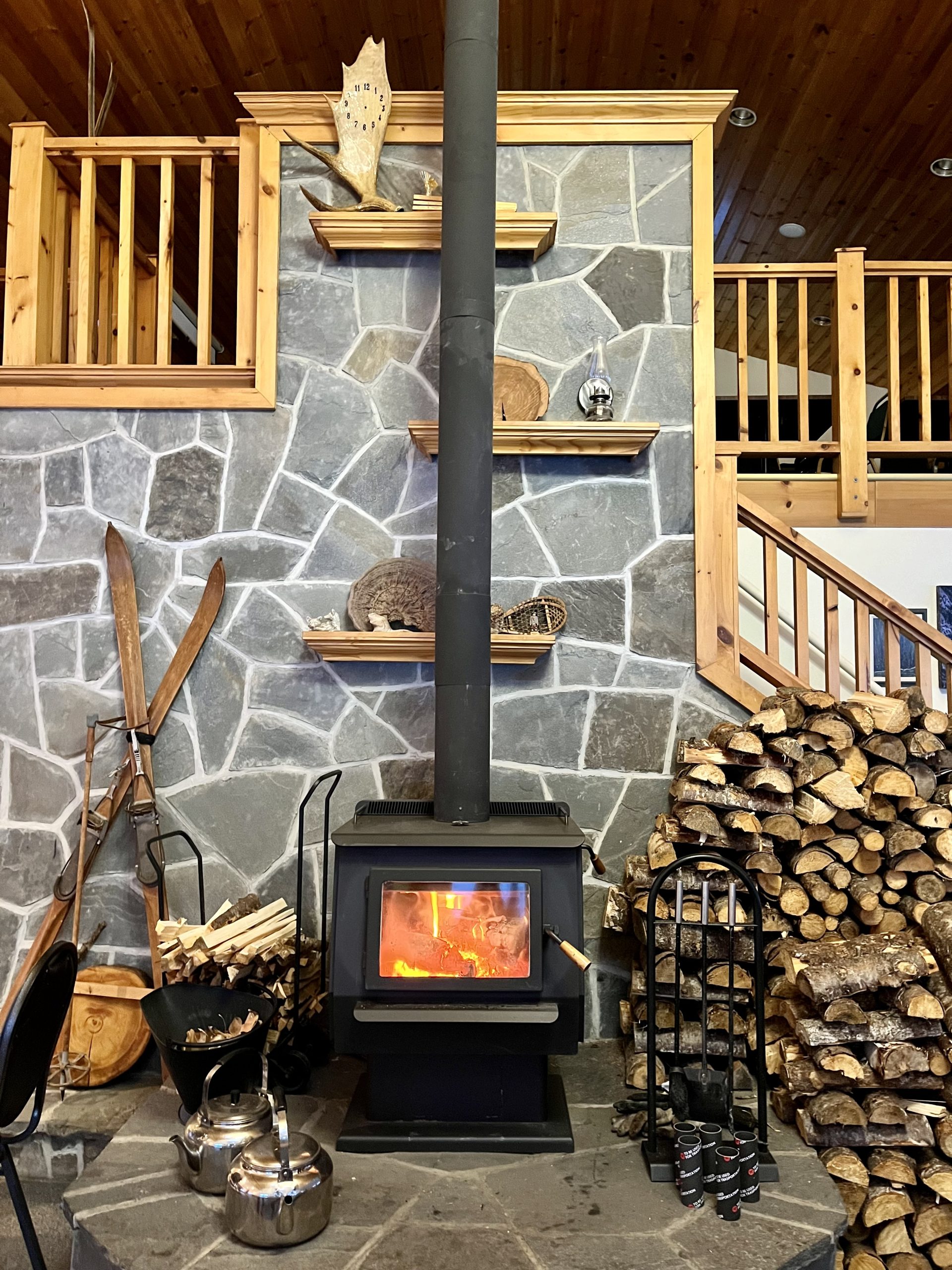 Stone fireplace with tall chimney flue
